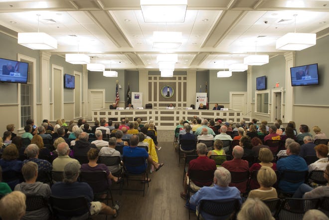 Tybee Island City Council candidates face off in a Monday night forum at the Burke Day Public Safety Building. [Will Peebles/Savannahnow.com]