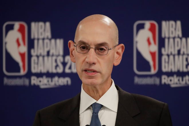 NBA Commissioner Adam Silver speaks at a news conference before an NBA preseason basketball game between the Houston Rockets and the Toronto Raptors Tuesday, Oct. 8, 2019, in Saitama, near Tokyo. (AP Photo/Jae C. Hong)
