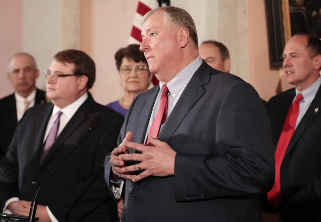 Ohio House Speaker Larry Householder, center, still has worries about Gov. Mike DeWine's gun violence reduction plan. [Joshua A. Bickel/Dispatch]