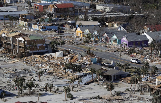 Homes destroyed by Hurricane Michael are shown Oct. 12, 2018, in Mexico Beach. A year after the storm, thousands are homeless, medical care and housing are at a premium, and domestic violence is increasing. [Gerald Herbert/The Associated Press/File]