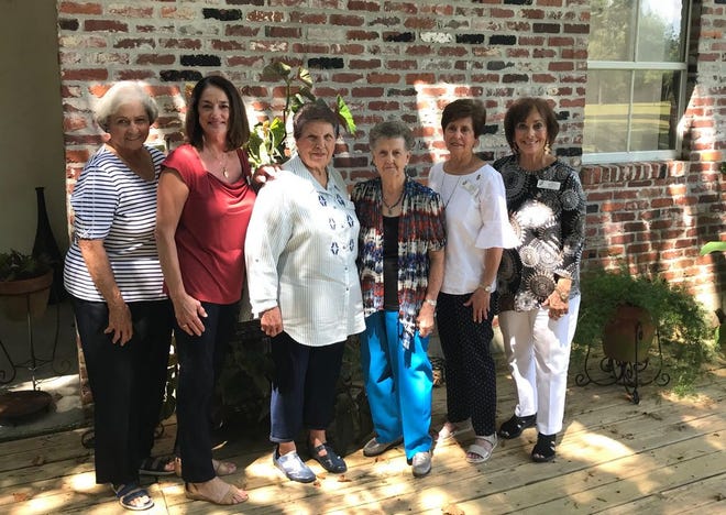 Hosting the garden club meeting from left are Gail Lonibos, Patti Mouton, Mabel Savoy, Lorraine Gautreau, Loretta Ramirez and Rita Bourque. Not pictured: Janis Poche
