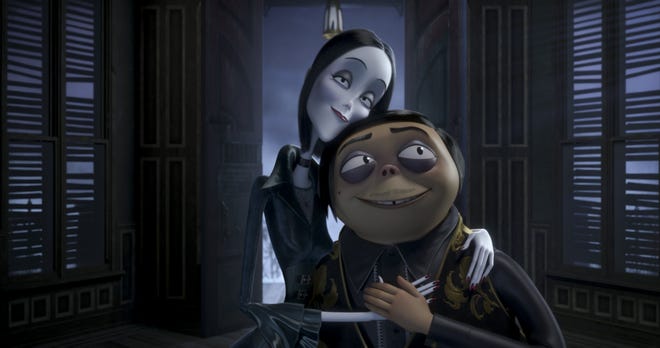 Morticia Addams, voiced by Charlize Theron, and Gomez Addams, voiced by Oscar Isaac, in "The Addams Family." [Metro Goldwyn Mayer Pictures]