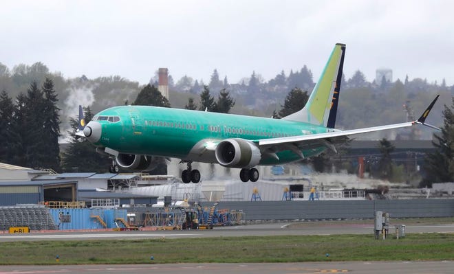 A Boeing 737 MAX 8 airplane being built for India-based Jet Airways lands in April following a test flight at Boeing Field in Seattle. Boeing and the Federal Aviation Administration are both partly at fault for the failures of the 737 Max, the plane model involved in two fatal crashes, according to a new report. The New York Times said Friday that a multiagency task force found that Boeing didn’t appropriately explain the plane’s new automated system to regulators, and the FAA didn’t have the capability to effectively analyze much of what Boeing did share about the plane.