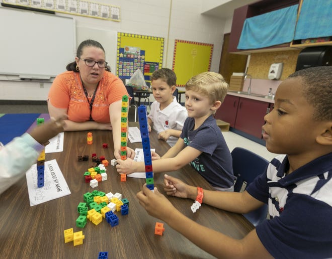 Back in August, kindergarten teacher Robin Ray leads her class on the first day of the 2019-20 academic year at Ocala Springs Elementary. The October student count showed that Marion County Public Schools hit a new record. [File photo]