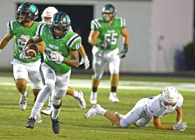 Van Buren wide receiver Damarius Newton heads for the end zone after a reception from quarterback Gary Phillips on Friday, Sept. 27, 2019, against Rogers at Blakemore Field. [BRIAN D. SANDERFORD/TIMES RECORD]