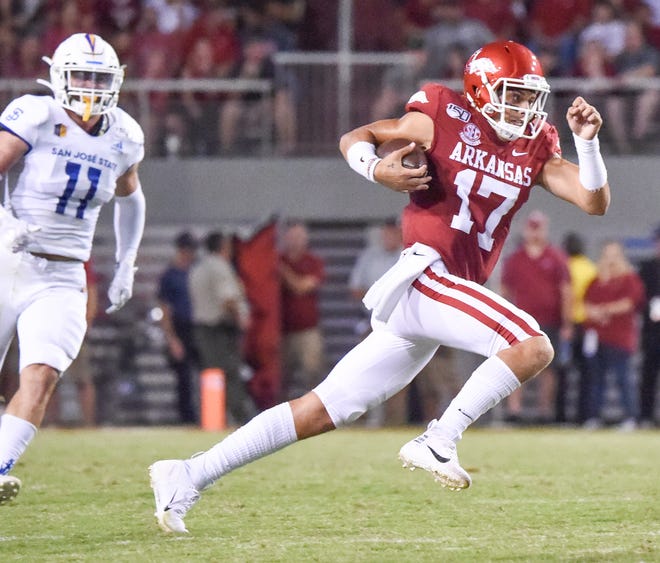 Arkansas quarterback Nick Starkel breaks away from the San Diego State defense on Saturday, Sept. 21, 2019, in Fayetteville. [CRAVEN WHITLOW/SPECIAL TO THE TIMES RECORD]