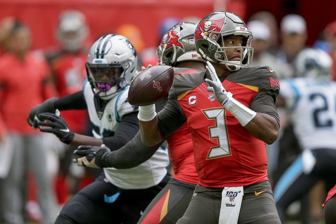 Jameis Winston committed six of Tampa Bay's seven turnovers in Sunday’s loss to the Carolina Panthers in London. [Tim Ireland/Associated Press]