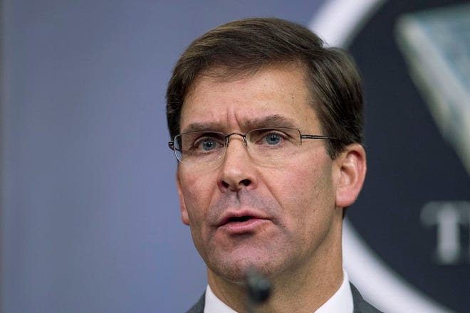 Secretary of Defense Mark Esper speaks to reporters during an August briefing at the Pentagon. Esper says the "impulsive" decision by Turkey to invade northern Syria will further destabilize a region already caught up in civil war. Esper says the invasion puts America's Syrian Kurdish partners "in harm's way," but insists the Kurds are not being abandoned.