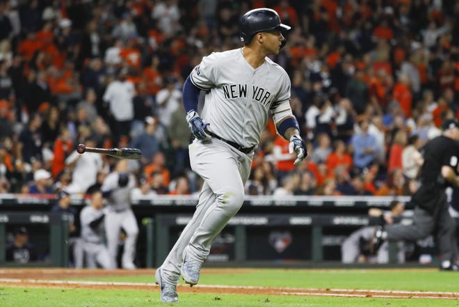 The New York Yankees' Gleyber Torres rounds the bases after a home run during the sixth inning in Game 1 of the American League Championship Series against the Astros on Saturday in Houston. [MATT SLOCUM/THE ASSOCIATED PRESS]