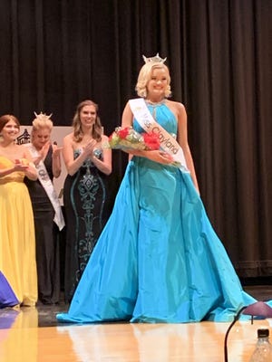 Baylee Joy Martin, Miss Clayland 2020, tries to take in the moment after receiving the title on Saturday. (TimesReporter.com / Cindy Davis)