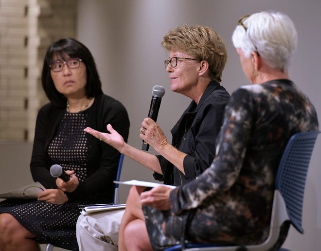 Consultant Mary Kress Littlepage (center) talks about the State of the Sector report about area nonprofits with Mari Kuraishi (left), president of the Jessie Ball duPont Fund, and Rena Coughlin, CEO of the Nonprofit Center. [Will Dickey/Florida Times-Union]