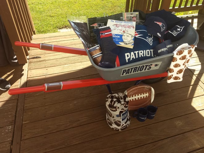 A New England Patriots wheelbarrow filled with all-things Patriots and tailgating is one of the raffle items available at the St. James Parish's 29th Harvest Fair Saturday, Nov. 2, 89 Main St., South Grafton, from 9 a.m. to 3 p.m. [Submitted Photo]