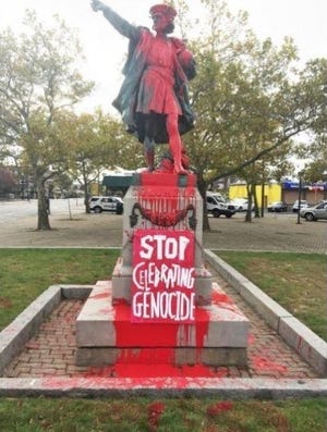 This statue of Christopher Columbus in Providence was covered in red paint by people against the celebration of Columbus Day. [Providence Journal]