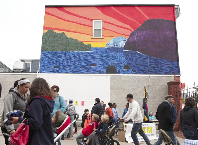 The painted mural at Salvation Cafe during the Broadway street fair on Saturday.

(Peter Silvia Photo)