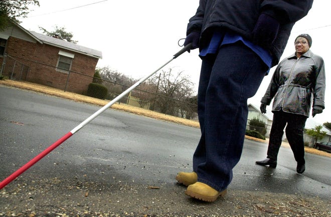 Fayetteville Veterans Affairs will host a White Cane Day 2K Walk/Run on Tuesday to support blind awareness. [File photo The Fayetteville Observer]