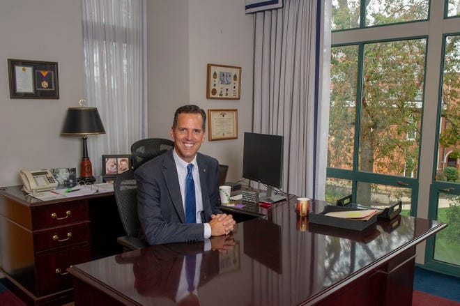 John Comerford in his office at Otterbein