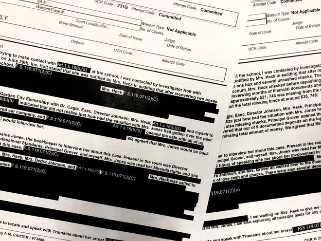 A side-by-side look at a recently released police report regarding a school bookkeeper charged with grand theft and fraud. The version released by the Jacksonville Sheriff's Office (left) was significantly more redacted than a version released by Duval County Public Schools. The discrepancy is causing concern among experts. [Emily Bloch/Florida Times-Union]