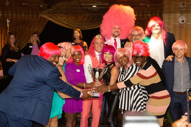 2018 Big Wigs celebrate their fundraising efforts last November. The 2019 Big Wig Bash is Nov. 7. [Photo courtesy of Susan G. Komen Coastal Georgia]