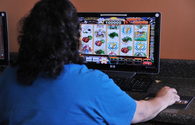Ordinances that Jacksonville adopted this year declare buisinesses using "simulated gambling devices" a public nuisance because of robberies and shootings that have happened around internet cafes with the same devices. [File/Florida Times-Union]