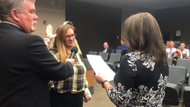 Brigit Bennington takes the oath of office on Tuesday as Mayor Pro Tem Bill Holland assists City Clerk Melinda Sayre. [Photo courtesy of the City of Hesperia.]