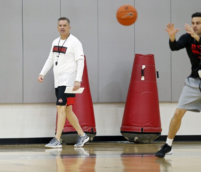 Ohio State men's basketball coach Chris Holtmann watches the Buckeyes practice at the practice gym inside the Schottenstein Center on Wednesday. [Kyle Robertson/Dispatch]