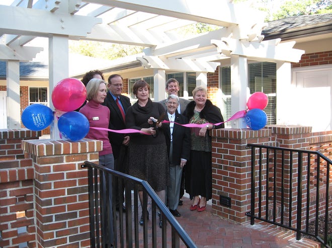 Children's Home Society staff and supporters cut the ribbon for the $1.4 million Buckner Place in 2010. The facility on San Diego Road in Jacksonville provided a group home for teen mothers in foster care and a transition program for older teen mothers. [Dan Scanlan/Florida Times-Union]
