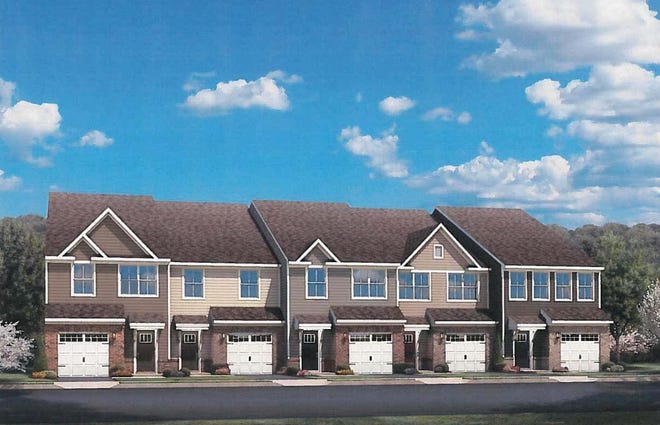 A rendering showing the materials and architectural details to be used in a planned 80-unit townhome complex along Neal Hawkins Road. [Development Solutions Group]