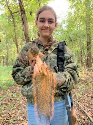 Emily Dyer killed her first squirrel, a fine fox squirrel, while hunting on Richard K. Yancey WMA shooting a .410 shotgun.