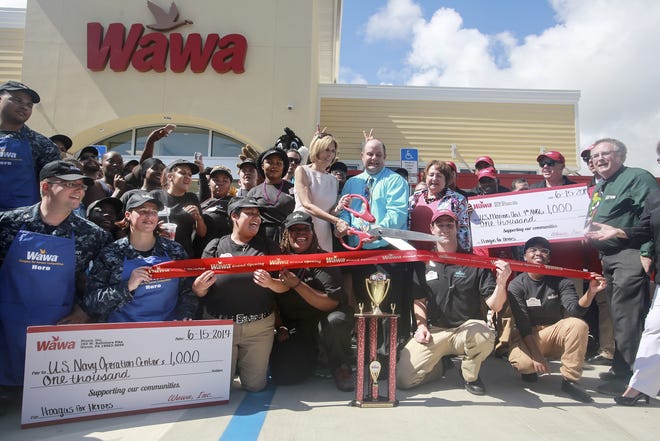 The new Wawa on Belvedere Road in West Palm Beach celebrated its grand opening with a ribbon cutting Thursday, June 15, 2017. (Bruce R. Bennett / The Palm Beach Post)