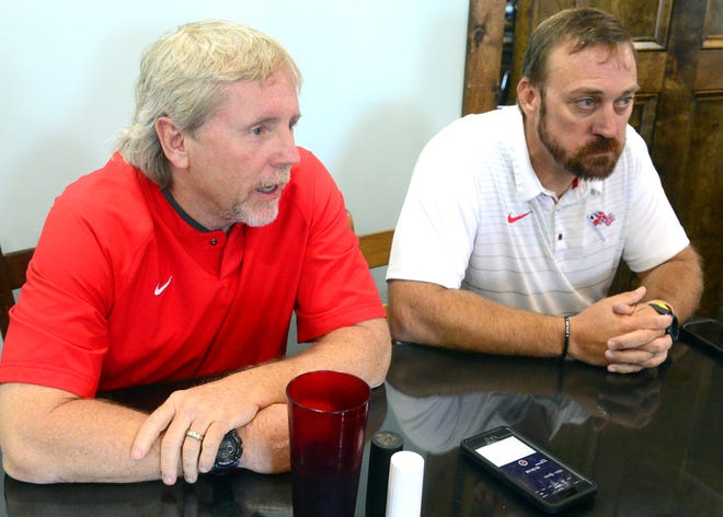 Gaston coach Swane Morris, left, and West End coach Kyle Davis are pictured at Lola's on the River on July 25, 2018 for The Gadsden Times' high school football media day. Gaston hosts West End on Friday. [The Gadsden Times/File]