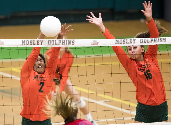 Mosley's Jalei Jomalon (2) and Liberty McLean (16 ) go up for the block against Wakulla on Thursday, October 17, 2019. [JOSHUA BOUCHER/THE NEWS HERALD]