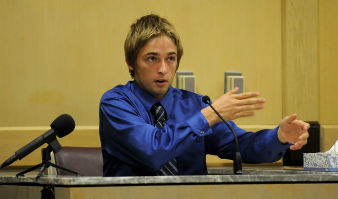 In a June 2012 fiel image, burn survivor Michael Brewer testifies in court about what happened the day he was burned by classmates. (Taimy Alvarez/Sun Sentinel/TNS)