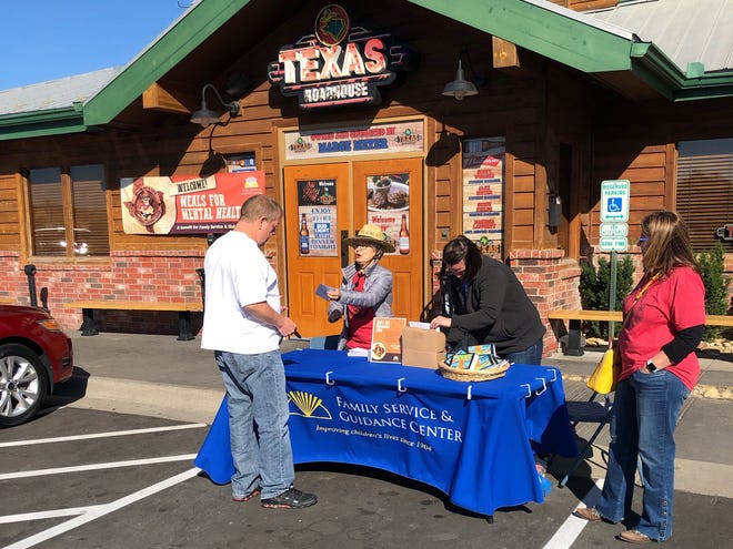 More than 500 people participated Friday in the Meals for Mental Health event that took place at Texas Roadhouse. Meals for Mental Health is an annual fundraiser for Family Service and Guidance Center, which provides assistance to children in northeast Kansas who have mental health needs. [Todd Fertig/Special to The Capital-Journal]