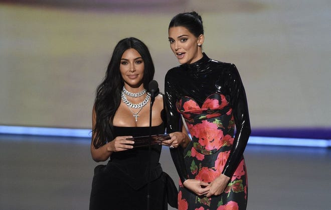 Kim Kardashian West, left, is seen with sister Kendall Jenner at the Emmy Awards on Sept. 22. Kardashian West spoke out in support of Texas death row inmate Rodney Reed on Saturday, urging Gov. Greg Abbott to take action.