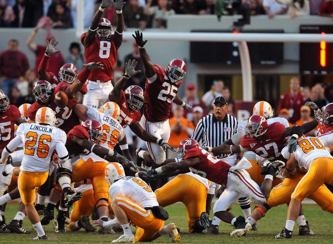Alabama defensive lineman Terrence Cody (62) blocks a field goal attempt by Tennessee kicker Daniel Lincoln (26) in the final seconds of game to preserve the Crimson Tide's 12-10 victory at Bryant-Denny Stadium on Saturday, Oct. 24, 2009. [File photo]