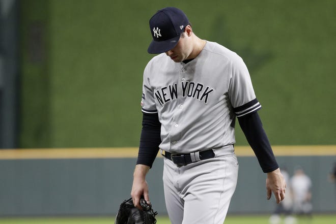 Yankees relief pitcher Adam Ottavino leaves a game against the Astros during the American League Championship Series. [Eric Gay/Associated Press]