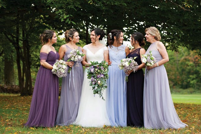 Claudete Lima-Ramsey and her 'maids kept consistency by ordering various colors and styles of chiffon Belsoie gowns from Wendy's Bridal.