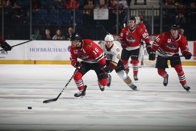 Rockford's Tyler Sikura breaks away for the game-winning goal with 11 seconds left in overtime on Saturday as the IceHogs secured their second straight 3-2 win. [PHOTO PROVIDED BY CHICAGO WOLVES]