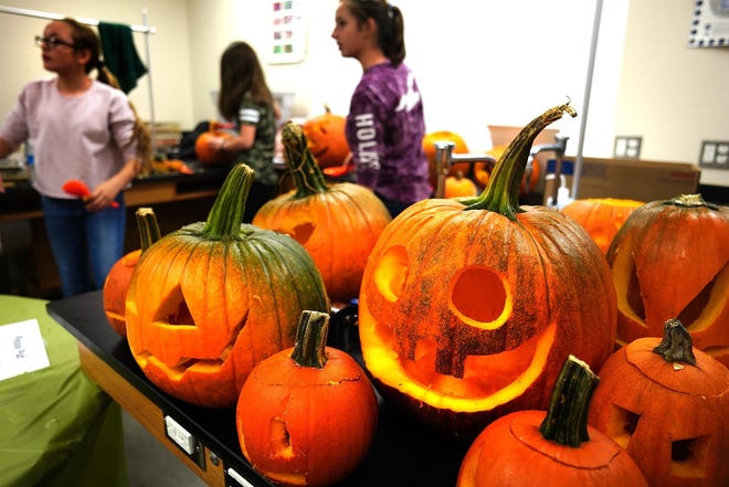The pumpkins carved for display during the Night of a Thousand Faces have a variety of shapes and facial designs. [Patriot Ledger File Photo]