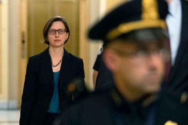 Deputy Assistant Secretary of Defense Laura Cooper arrives Wednesday for a closed-door meeting to testify as part of the House impeachment inquiry into President Donald Trump, [PATRICK SEMANSKY/THE ASSOCIATED PRESS]