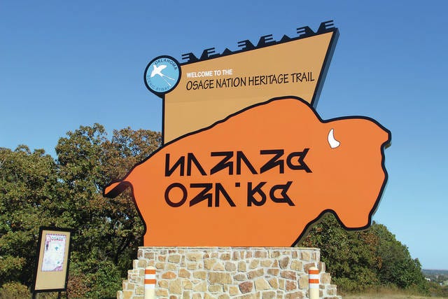 This impressive sign welcomes motorists to the Osage Nation Heritage Trail, just outside Bartlesville on Highway 60. It is the largest element of a roadside turnout that also offers visitors information about the land, people and development of Osage County. Robert Smith/Journal-Capital