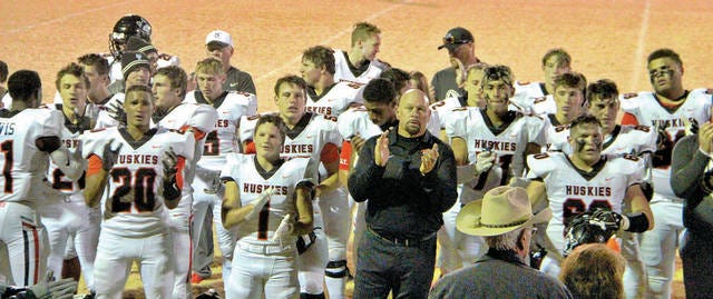 They left it on the field. A weary bunch of Huskies joins the fans in singing the PHS school song after defeating Hominy. Robert Smith/Journal-Capital