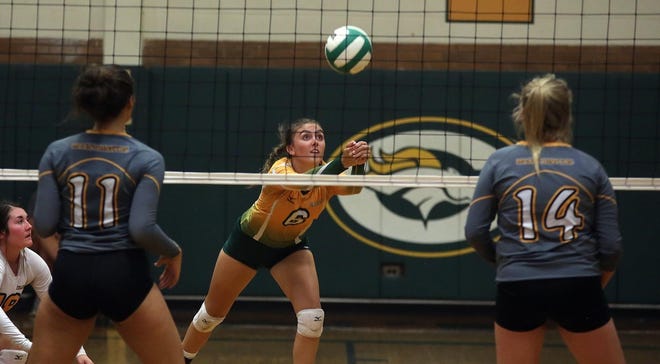 Crest's Paige McIntyre prepares for a volley during her team's game with Kings Mountain earlier this season. [BRITTANY RANDOLPH/The Star]