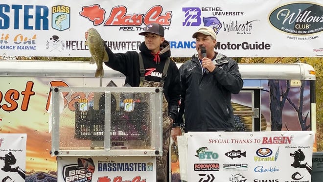 Topeka resident Parker Still, a senior at Shawnee Heights, shows his 3.24-pound smallmouth bass he caught while fishing at the Big Bass Junior Championship in Idaho during the weigh-in this past weekend. Still took fifth in the country and won a trip to fish in Mexico on the Lake El Salto. [Submitted]