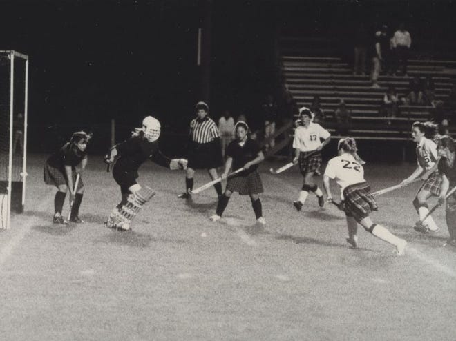 Barnstable High School players (in dark jerseys) attempt to clear the ball out of their zone in 1989 field hockey action against Falmouth.



Barnstable Patriot Files/W.B. Nickerson Cape Cod History Archives