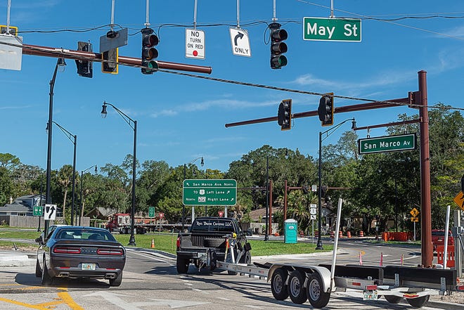 A truck pulling a boat trailer makes a wide right turn from San Marco Avenue onto May Street in St. Augustine on Friday. The Florida Department of Transportation project has redesigned and rebuilt the intersection to improve traffic flow. [PETER WILLOTT/THE RECORD]