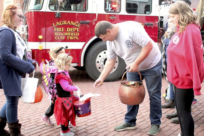 Halloween activities already were in full swing this week, including the annual “Halloween & Heroes” event held Wednesday in LaGrange, Ind. Children took part in a meet and greet with local heroes and also received treats.[Michelle Patrick/Journal]