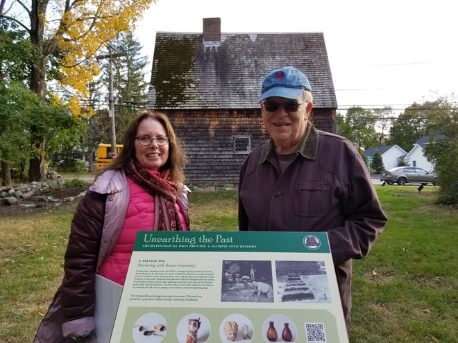 Peak House Heritage Center directors Michele Feinsilver Hoye and Rob Gregg with a new informational panel at the building site. Wicked Local photo/Mike Gleason