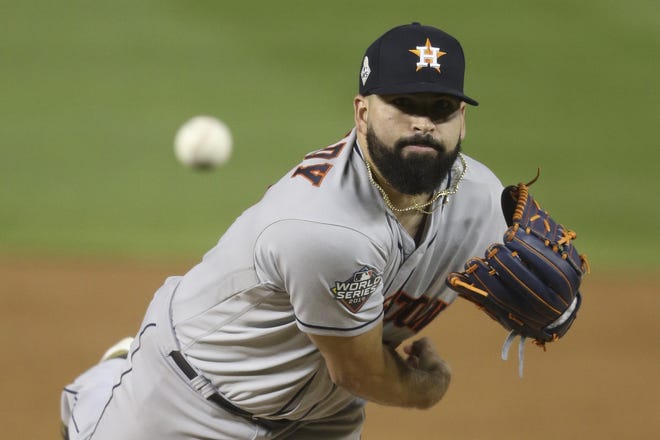 Houston Astros starting pitcher Jose Urquidy throws during Game 4 of the World Series against the Washington Nationals on Saturday in Washington. [AP Photo/Will Newton, Pool]