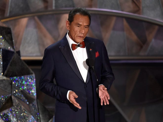 Wes Studi introduces a tribute to films that honor service in the military at the Oscars on Sunday, March 4, 2018, at the Dolby Theatre in Los Angeles. [Photo by Chris Pizzello/Invision/AP]